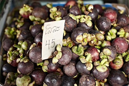 Mangosteen for sale at market Foto de stock - Sin royalties Premium, Código: 649-06433237