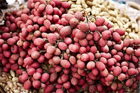 Close up of pile of lychee fruit Foto de stock - Sin royalties Premium, Código: 649-06433230