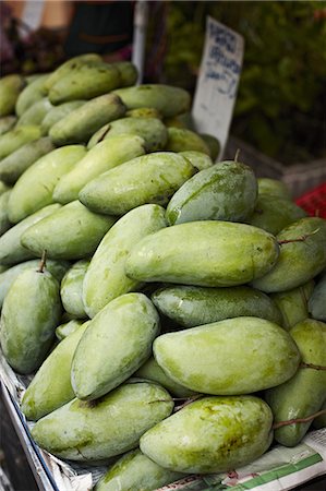 Green mango for sale at market Foto de stock - Sin royalties Premium, Código: 649-06433242