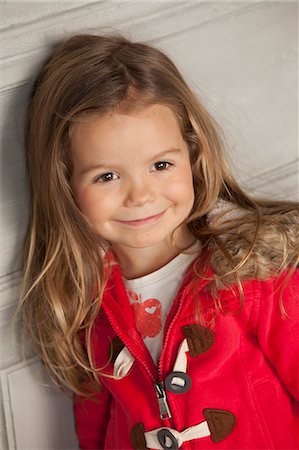 portrait in cute child girl - Close up of girls smiling face Foto de stock - Sin royalties Premium, Código: 649-06433332