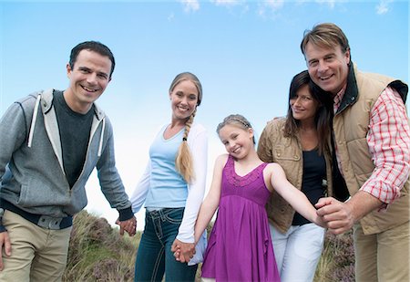 portrait family of five pose - Family smiling together outdoors Stock Photo - Premium Royalty-Free, Code: 649-06433471