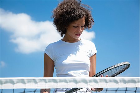 fracaso - Tennis player with racket on court Foto de stock - Sin royalties Premium, Código: 649-06433608