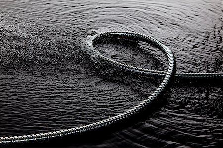 fantasme - Coiled metal tube in water Stock Photo - Premium Royalty-Free, Code: 649-06433659