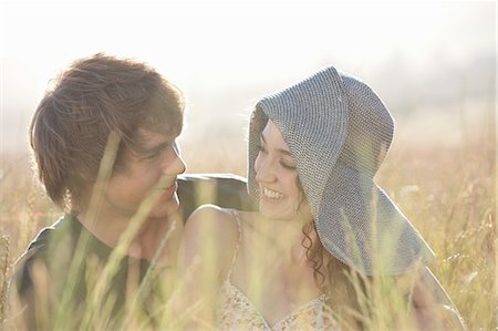 Couple relaxing in tall grass Stock Photo - Premium Royalty-Free, Code: 649-06488559