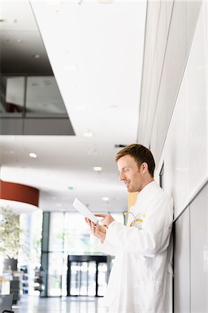 responsible man - Doctor using tablet computer Stock Photo - Premium Royalty-Free, Code: 649-06488642