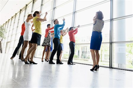 european union - Business people dancing in office Stock Photo - Premium Royalty-Free, Code: 649-06488713
