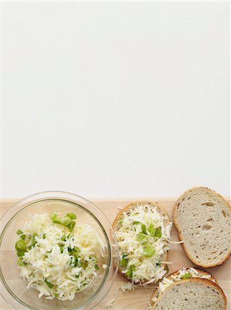 spring onion isolated - Cheese and onion sandwiches on board Stock Photo - Premium Royalty-Free, Code: 649-06488846