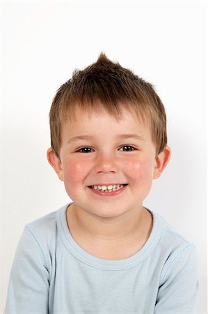 people portrait on white background - Close up of boys smiling face Stock Photo - Premium Royalty-Free, Code: 649-06488930