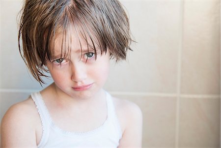 pouting - Girl crying in bathroom Stock Photo - Premium Royalty-Free, Code: 649-06489051
