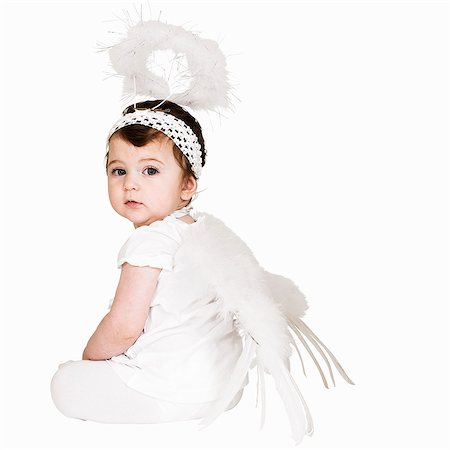 simsearch:640-03265441,k - Toddler girl wearing angel costume Foto de stock - Sin royalties Premium, Código: 649-06489295