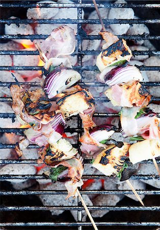 flame grilled chicken photography - Skewers cooking on grill Stock Photo - Premium Royalty-Free, Code: 649-06489358