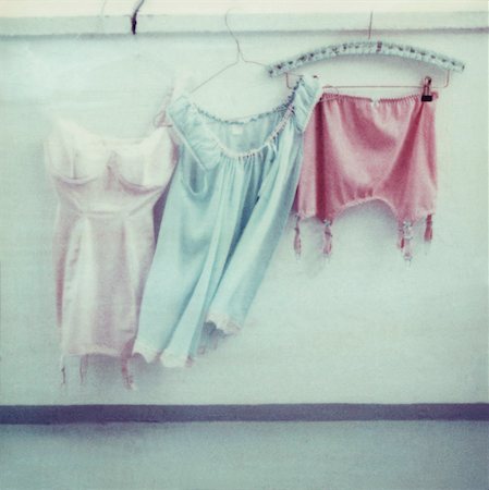 quadratisches bild - Womens clothes on hangers Stockbilder - Premium RF Lizenzfrei, Bildnummer: 649-06489353