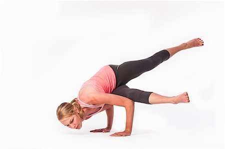 Woman practicing yoga Stock Photo - Premium Royalty-Free, Code: 649-06489679
