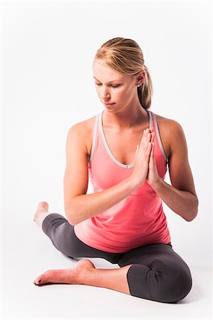 stretching top view - Woman practicing yoga Stock Photo - Premium Royalty-Free, Code: 649-06489681