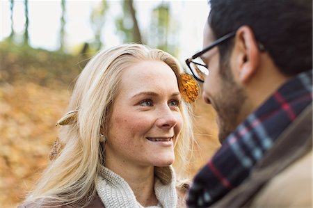 stubble - Smiling couple standing in forest Stock Photo - Premium Royalty-Free, Code: 649-06489784
