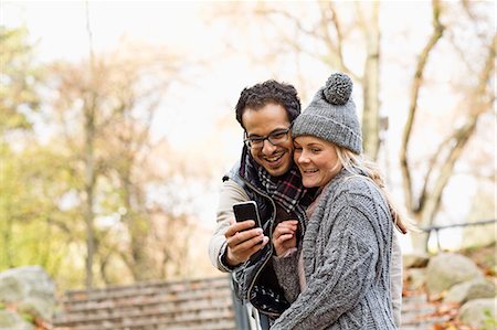 Couple taking picture of themselves Foto de stock - Sin royalties Premium, Código: 649-06489825