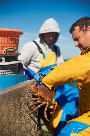 fishing boat - Fisherman at work on boat Stock Photo - Premium Royalty-Free, Code: 649-06489864