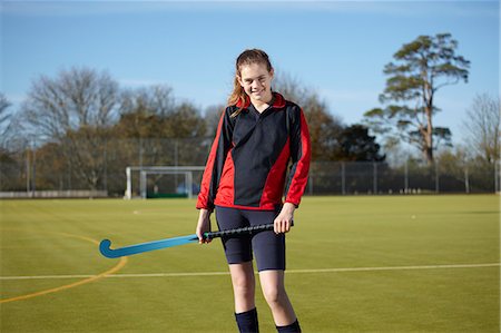 field hockey - Lacrosse player standing on field Stock Photo - Premium Royalty-Free, Code: 649-06490111