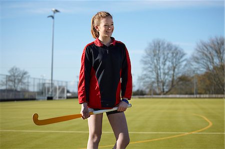 field hockey - Lacrosse player standing on field Stock Photo - Premium Royalty-Free, Code: 649-06490112