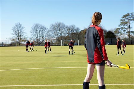 field hockey - Lacrosse player standing in game Stock Photo - Premium Royalty-Free, Code: 649-06490129