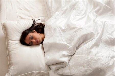 single bed - Woman sleeping in bed Stock Photo - Premium Royalty-Free, Code: 649-06532547