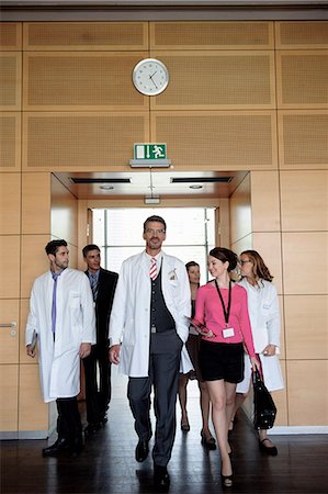 Business people and doctors in office Fotografie stock - Premium Royalty-Free, Codice: 649-06532630