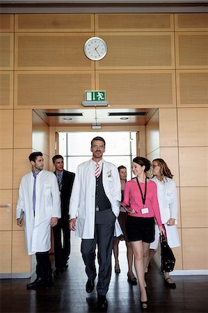 physicians walking front view - Business people and doctors in office Stock Photo - Premium Royalty-Free, Code: 649-06532630