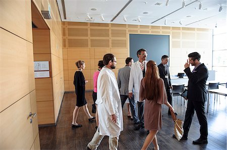 doctor walking - Business people and doctors in office Stock Photo - Premium Royalty-Free, Code: 649-06532632