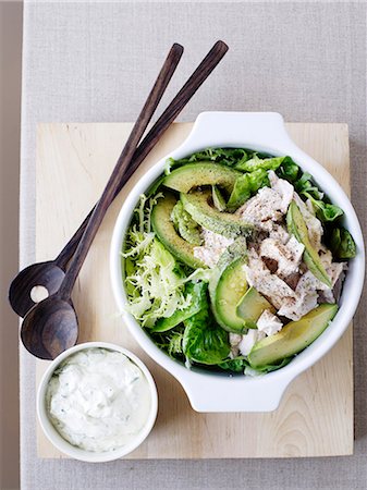 salads on spoons overhead - Bowl of chicken and avocado salad Stock Photo - Premium Royalty-Free, Code: 649-06532662