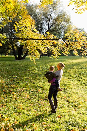 family overhead - Mother holding son in park Stock Photo - Premium Royalty-Free, Code: 649-06532690