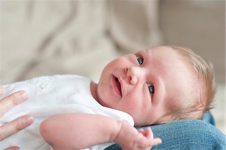 Mother holding infant son on lap Stock Photo - Premium Royalty-Free, Code: 649-06532736