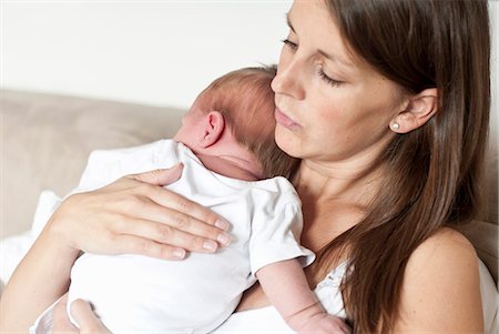 Mother holding infant son Photographie de stock - Premium Libres de Droits, Code: 649-06532733