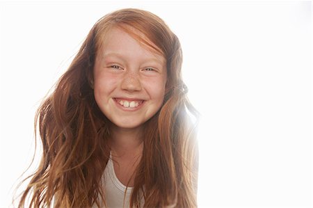 simsearch:649-06533100,k - Close up of girls smiling face Stock Photo - Premium Royalty-Free, Code: 649-06533116