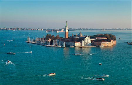 Buildings on island in urban harbor Stock Photo - Premium Royalty-Free, Code: 649-06533189