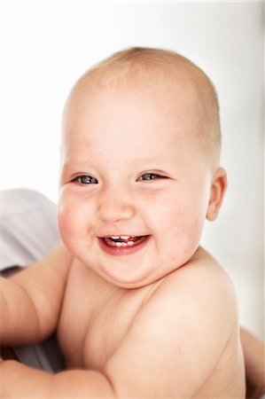russia - Close up of baby girls laughing face Stock Photo - Premium Royalty-Free, Code: 649-06533388
