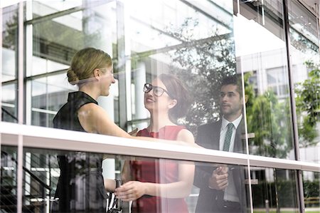 foyer - Business people talking by window Stock Photo - Premium Royalty-Free, Code: 649-06622120