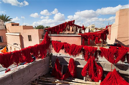 pictures of rooftop clotheslines - Dyed wool drying on lines Stock Photo - Premium Royalty-Free, Code: 649-06622278
