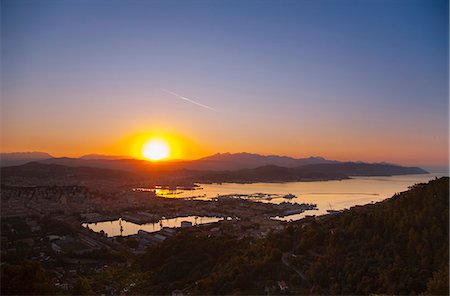 sunrise and city - Aerial view of La Spezia and harbor Stock Photo - Premium Royalty-Free, Code: 649-06622305