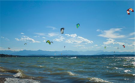 Sails of kitesurfers over choppy waves Stock Photo - Premium Royalty-Free, Code: 649-06622329