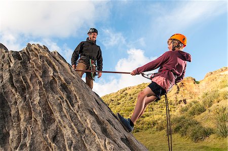 parent teaching outdoor - People abseiling in rock climbing lesson Stock Photo - Premium Royalty-Free, Code: 649-06622365