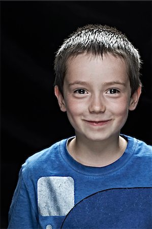 simsearch:649-06622586,k - Close up of boys smiling face Photographie de stock - Premium Libres de Droits, Code: 649-06622408