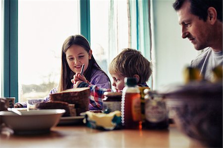 simsearch:649-05949948,k - Family eating together at table Stock Photo - Premium Royalty-Free, Code: 649-06622415