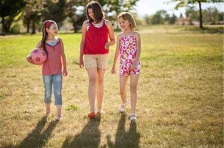 simsearch:649-06490139,k - Girls walking together in field Stock Photo - Premium Royalty-Free, Code: 649-06622479