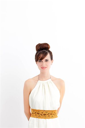 portrait elegant woman - Smiling woman wearing gown Stock Photo - Premium Royalty-Free, Code: 649-06622575