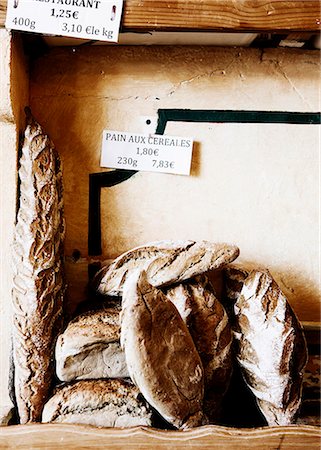 Loaves of bread for sale in bakery Photographie de stock - Premium Libres de Droits, Code: 649-06622593