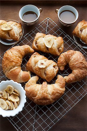 Baked pastries with banana and coffee Stock Photo - Premium Royalty-Free, Code: 649-06622652