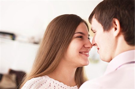 person rubbing nose - Smiling couple touching noses Stock Photo - Premium Royalty-Free, Code: 649-06622693