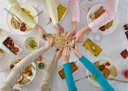 four dinner - Overhead view of people sharing at table Stock Photo - Premium Royalty-Free, Code: 649-06623164