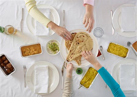 flat bread - Overhead view of people at table Stock Photo - Premium Royalty-Free, Code: 649-06623161