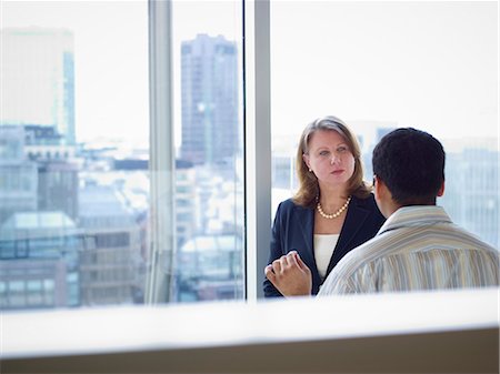 Business people talking in office Stock Photo - Premium Royalty-Free, Code: 649-06716622